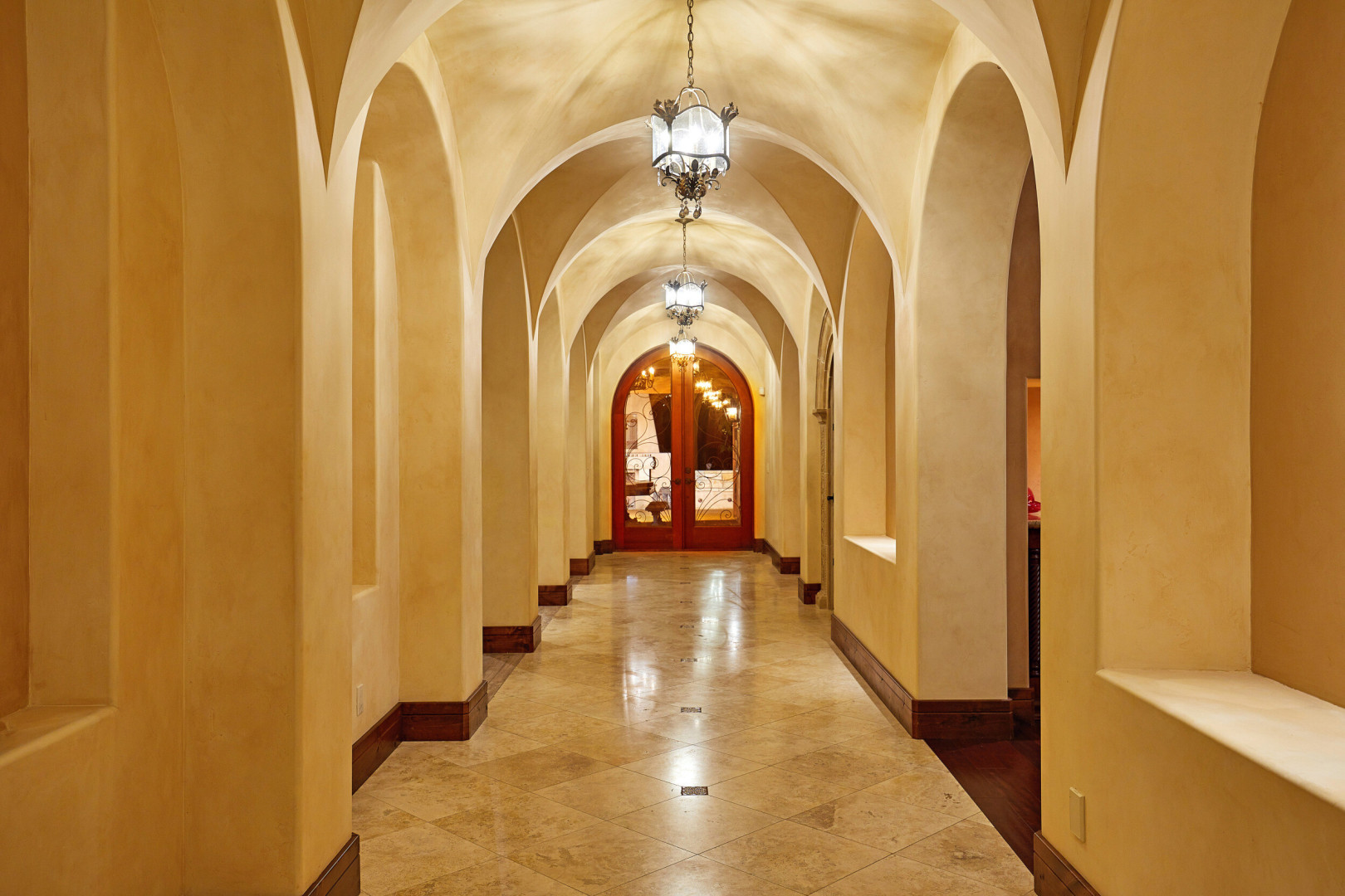 Luxury home boasting a long marble entryway, Rancho Santa Fe CA