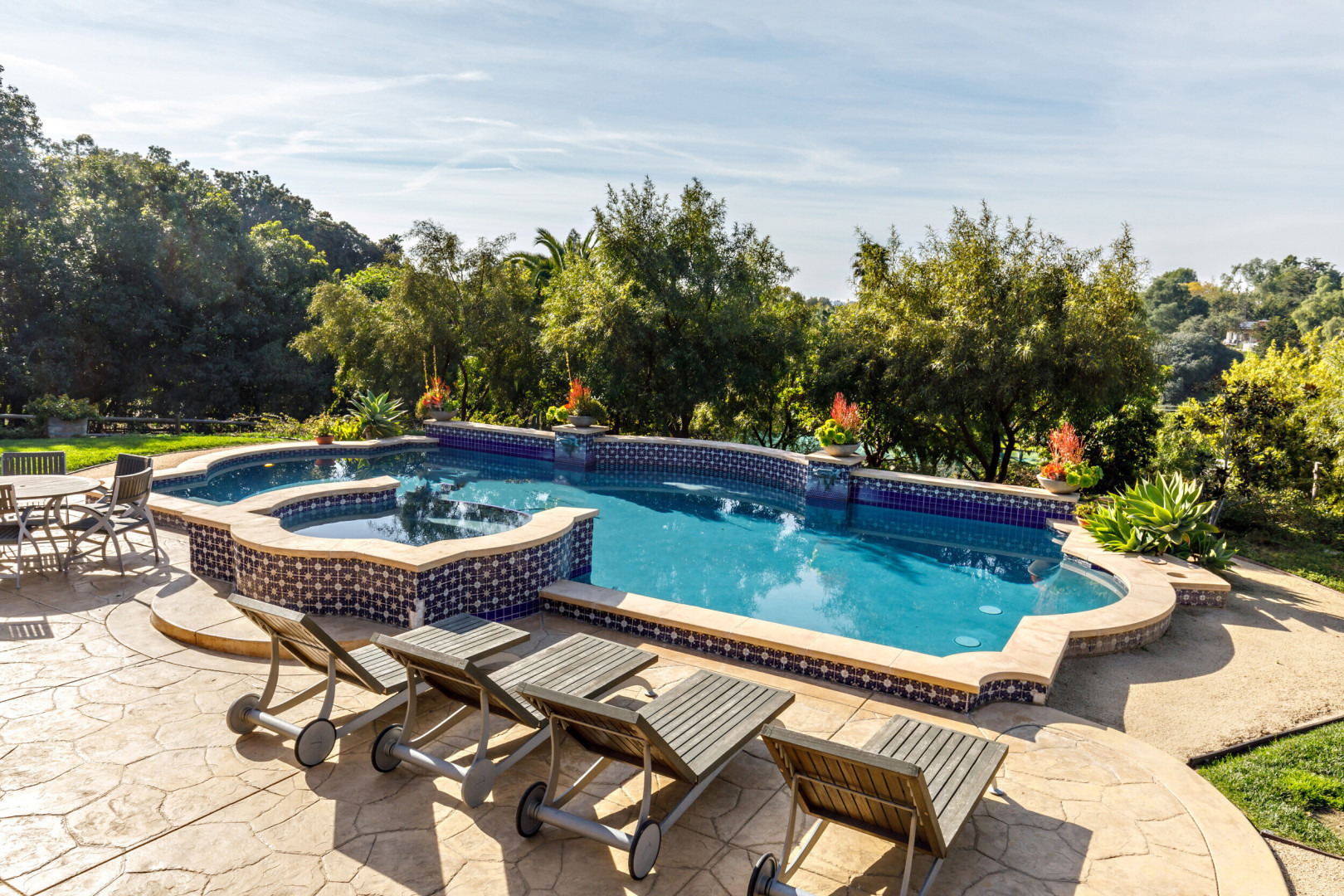 Luxury home boasting a beautiful backyard with a pool, Rancho Santa Fe CA