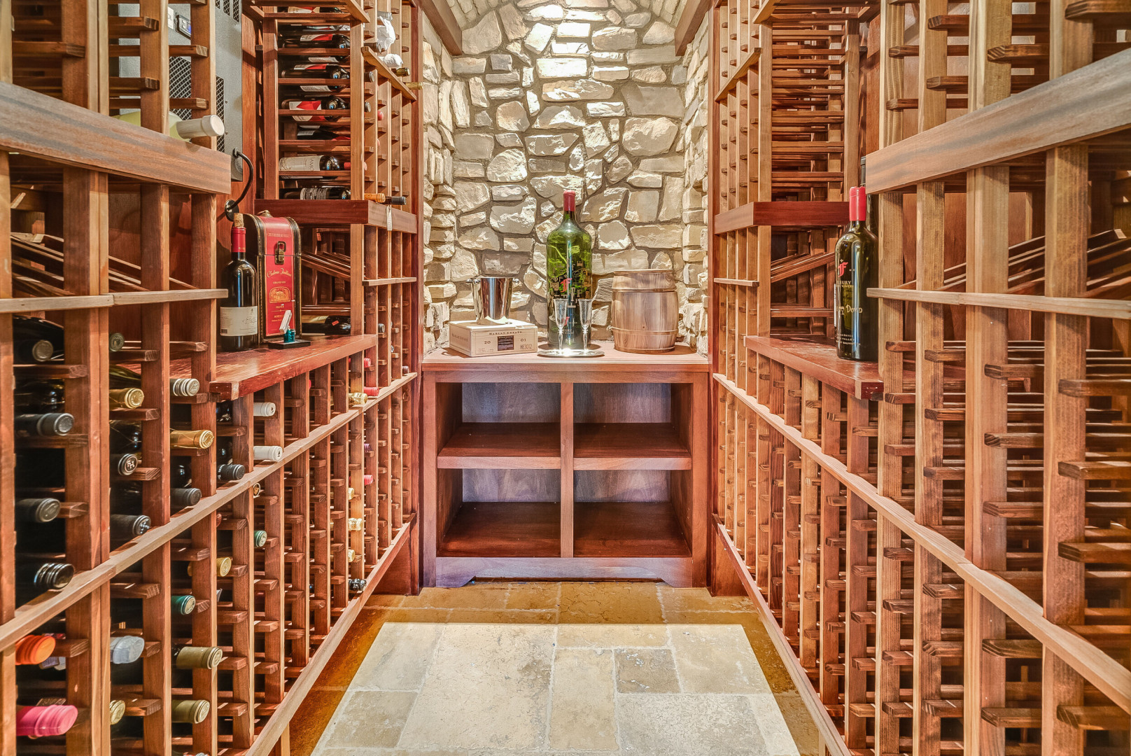 Custom wine room boasting wood and stone throughout, Rancho Santa Fe CA