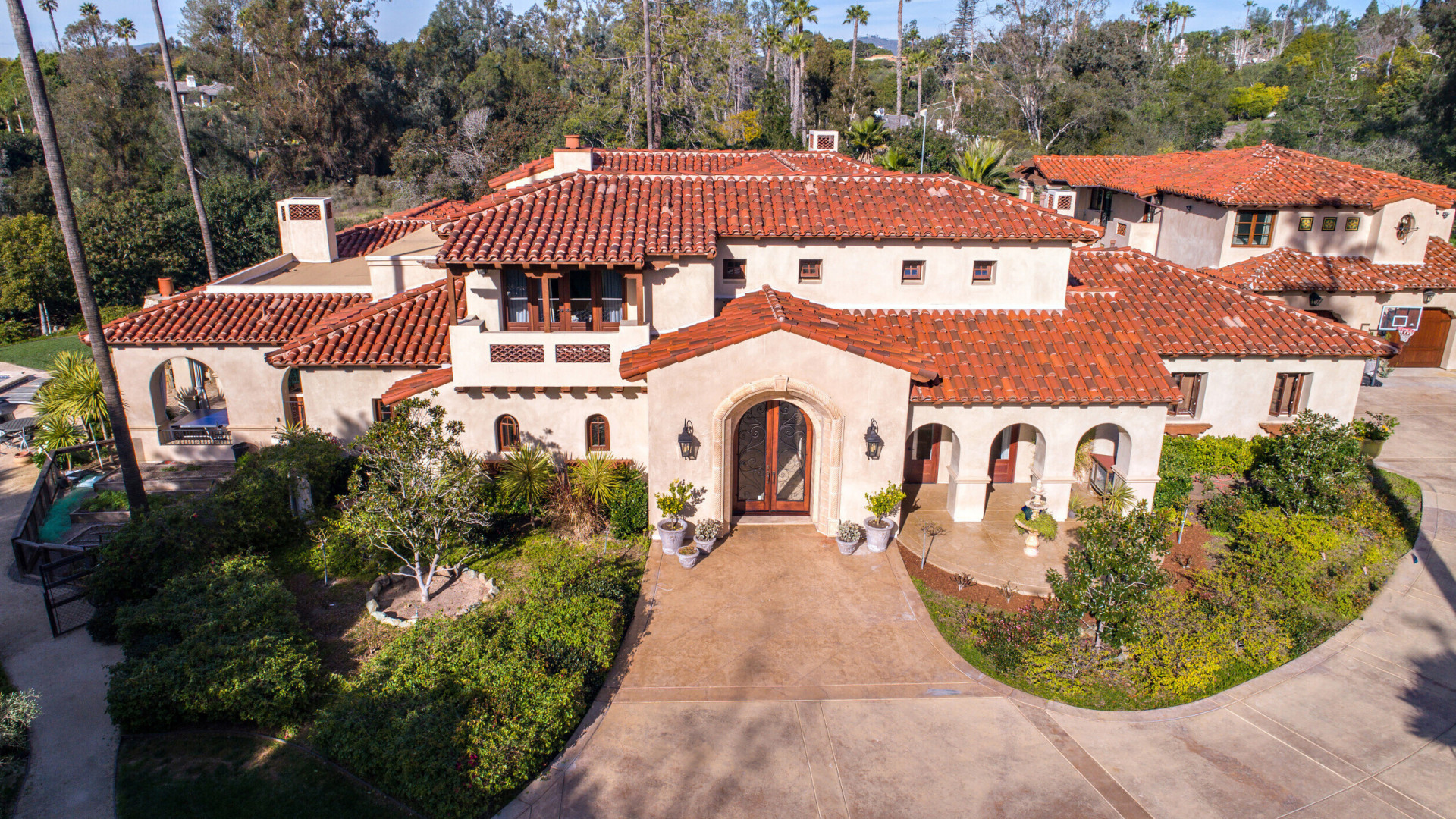Aerial view of tuscan inspired luxury home with a guest house, Rancho Santa Fe CA