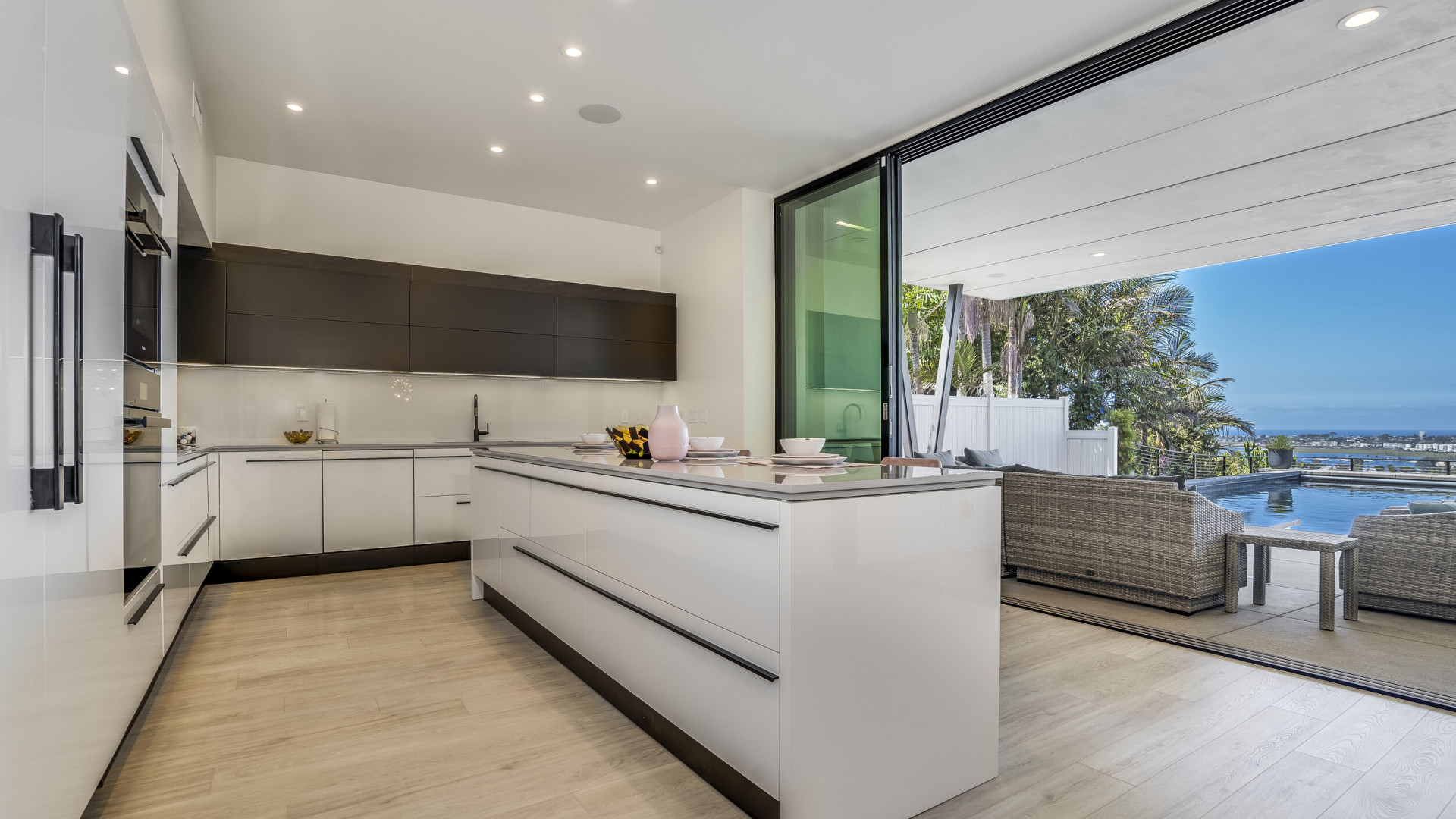Luxury modern kitchen boasting custom cabinetry through, Rancho Santa Fe CA