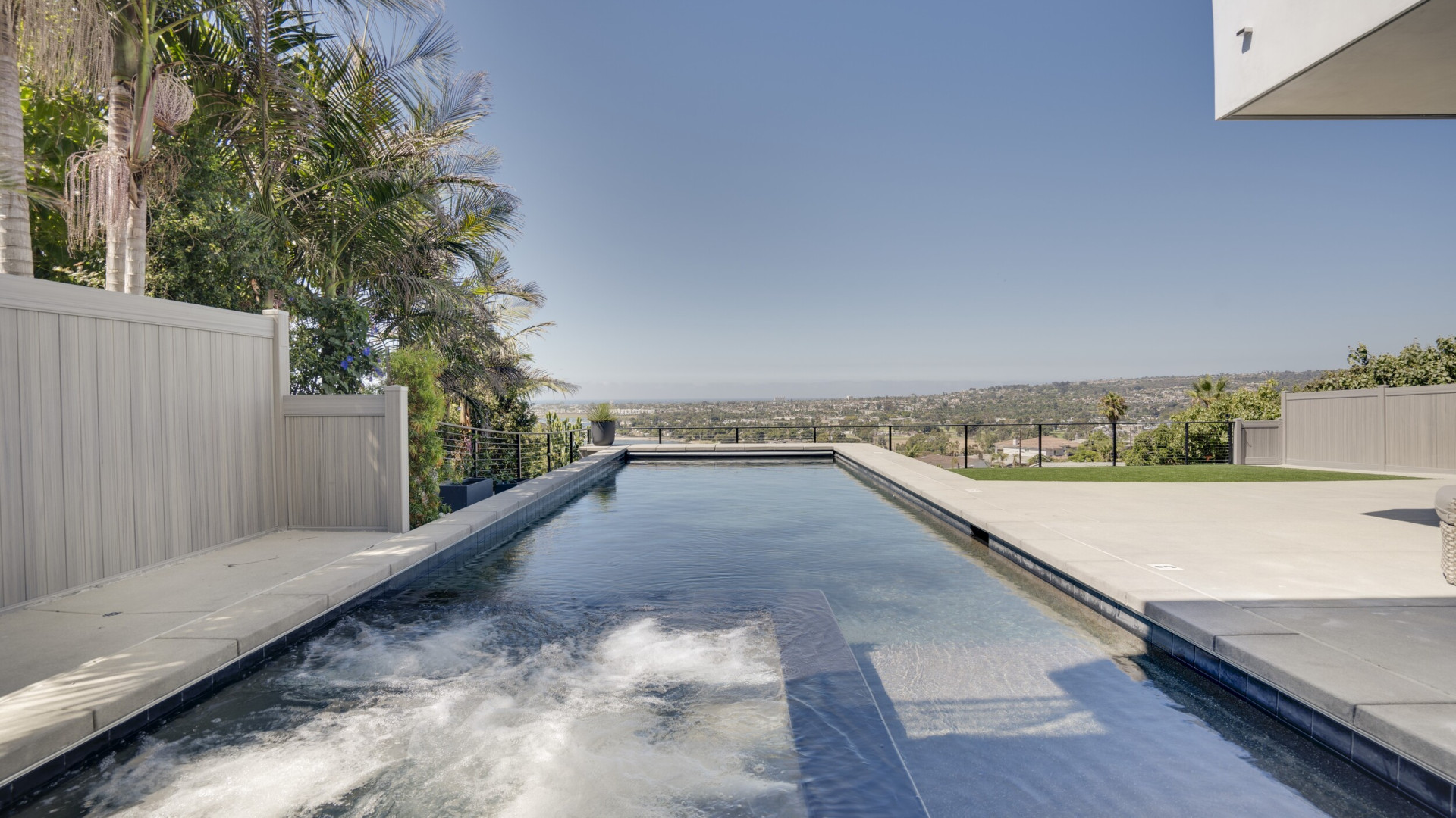 Luxury modern home boasting an infinity pool overlooking the ocean, Rancho Santa Fe CA